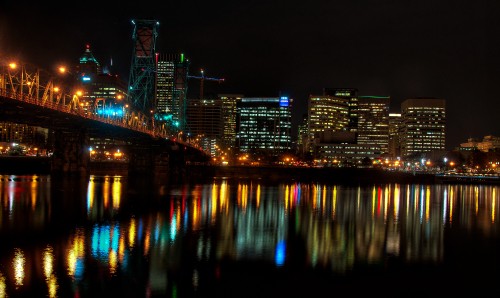 Image bridge over water during night time