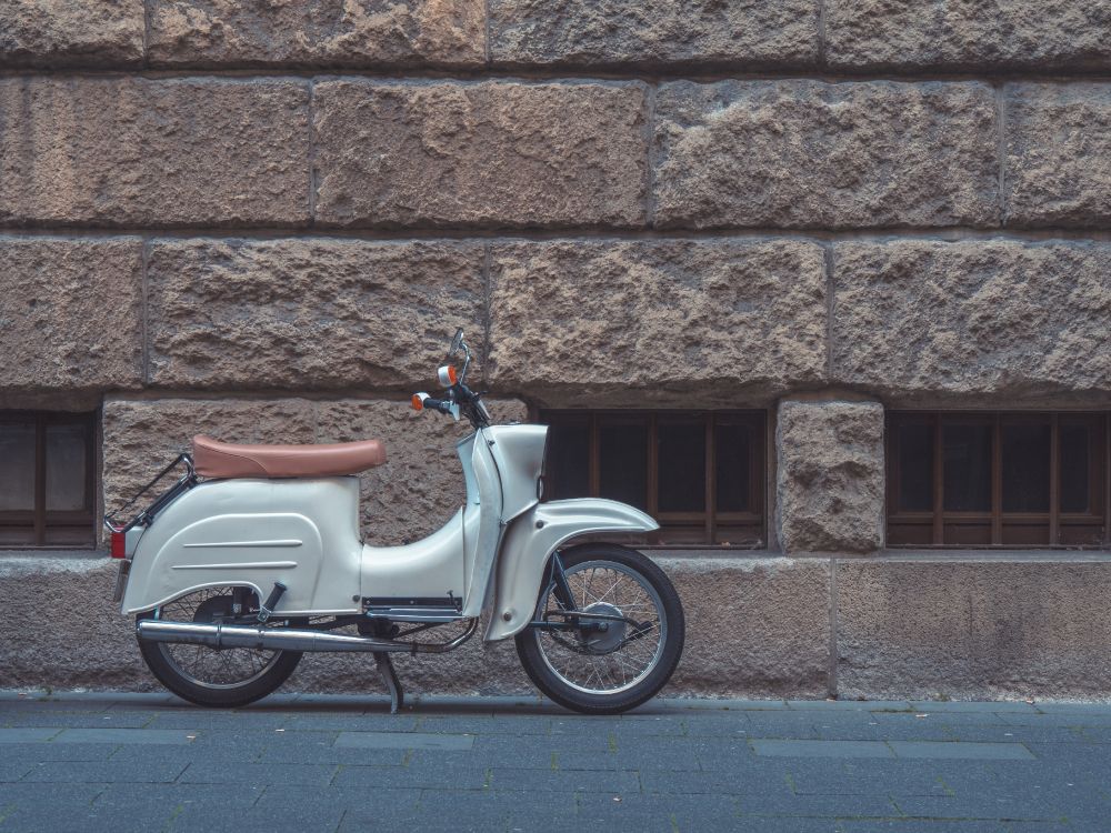 White and Brown Motor Scooter Parked Beside Brown Brick Wall. Wallpaper in 5184x3888 Resolution