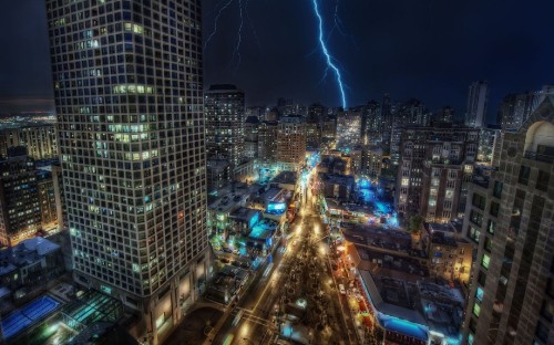 Image aerial view of city buildings during night time