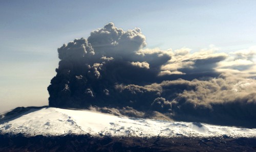 Image white clouds over green mountain