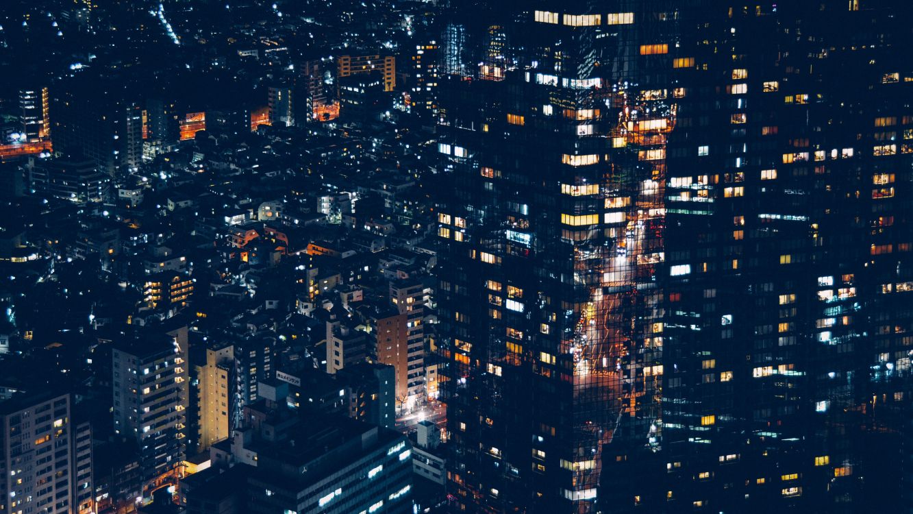 aerial view of city buildings during night time