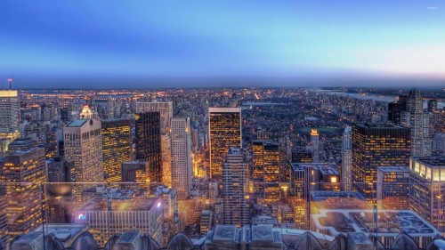 Image aerial view of city buildings during night time