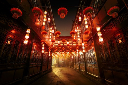 Image red and white pendant lamps turned on in building