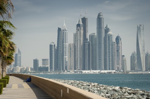 Image city skyline across the sea during daytime