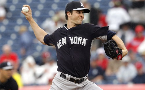 Image man in black and white baseball jersey shirt and white pants