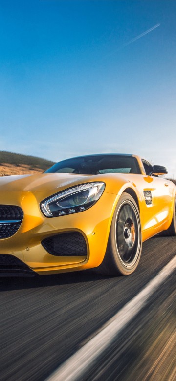 Image yellow mercedes benz coupe on road during daytime