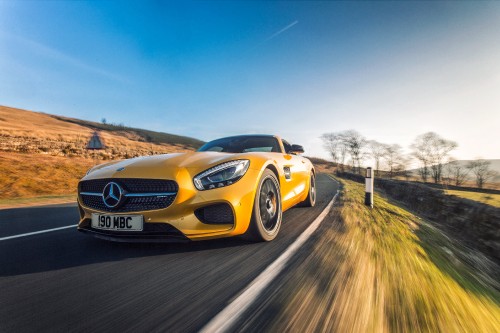 Image yellow mercedes benz coupe on road during daytime