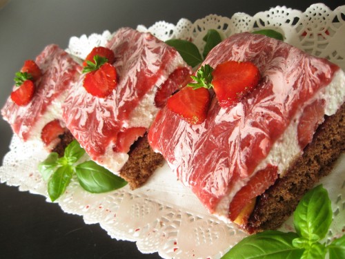 Image sliced meat on white ceramic plate