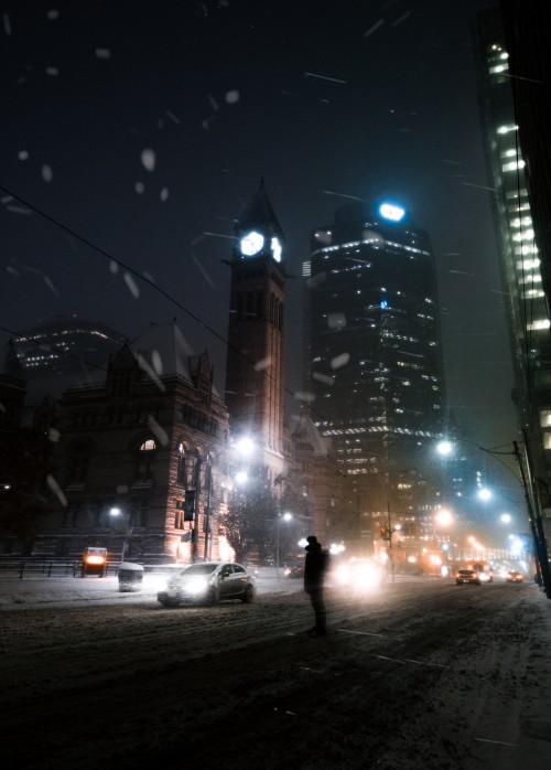 Image people walking on street during night time