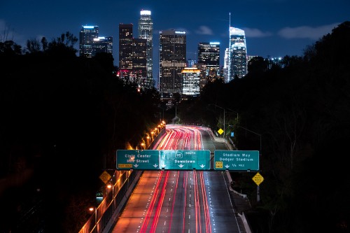 Image time lapse photography of city during night time