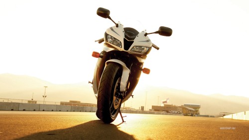 Image black and gray motorcycle on road during daytime