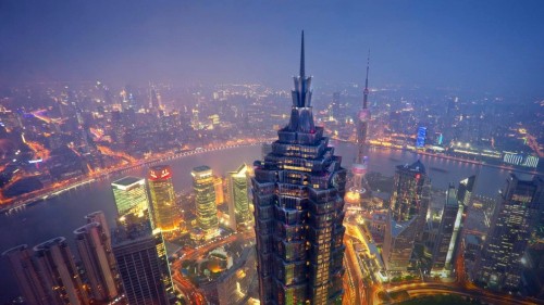 Image aerial view of city buildings during night time