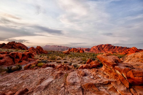 Image brown rocky mountain under cloudy sky during daytime