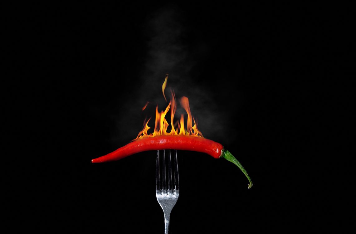 Stainless Steel Fork With Red Chili. Wallpaper in 5792x3806 Resolution