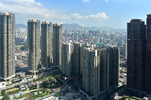 Image high rise buildings under blue sky during daytime