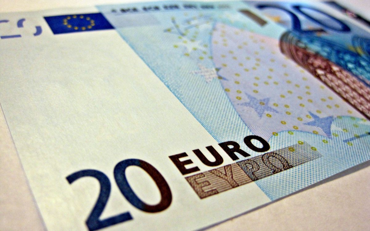 20 euro bill on white textile