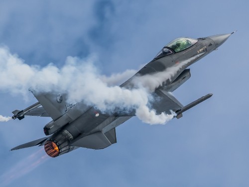 Image gray jet plane flying in the sky