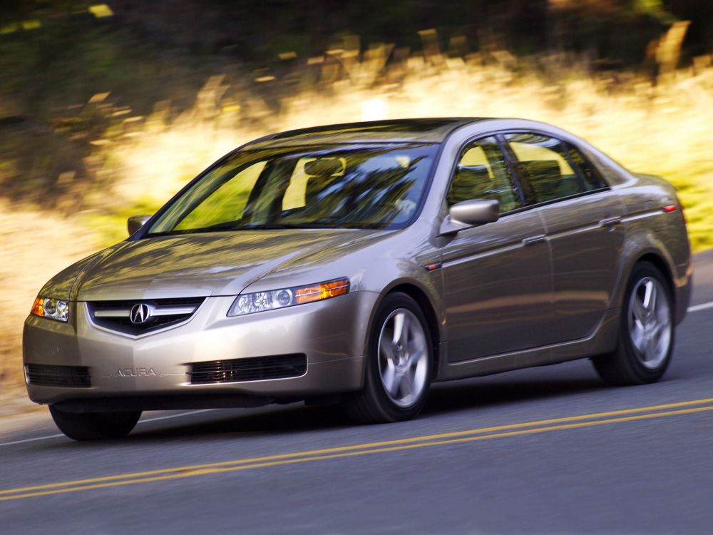 black honda sedan on road during daytime