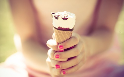 Image person holding ice cream cone