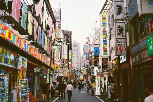 Image people walking on street during daytime