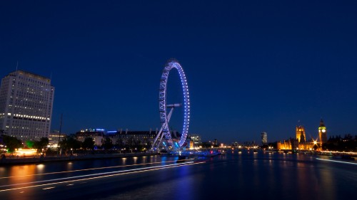 Image ferris wheel near body of water during night time