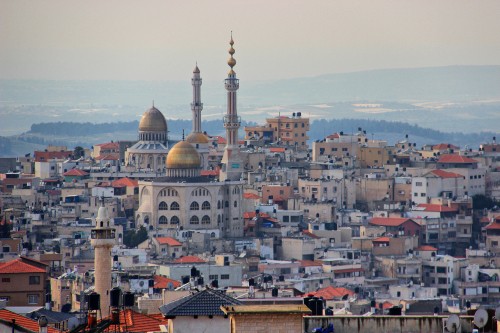 Image aerial view of city buildings during daytime