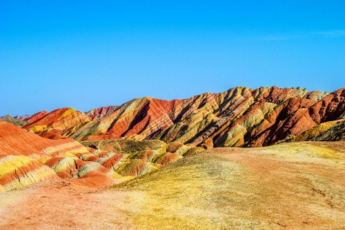 Image brown and gray rock formation under blue sky during daytime