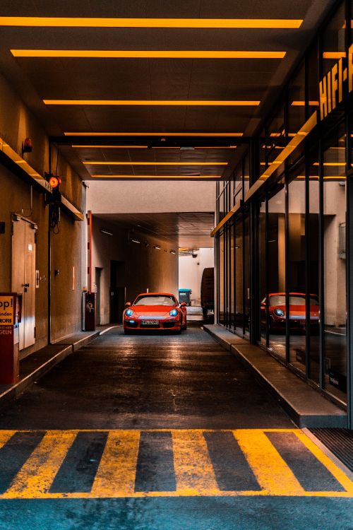 Red Car Parked on Tunnel. Wallpaper in 4000x6000 Resolution