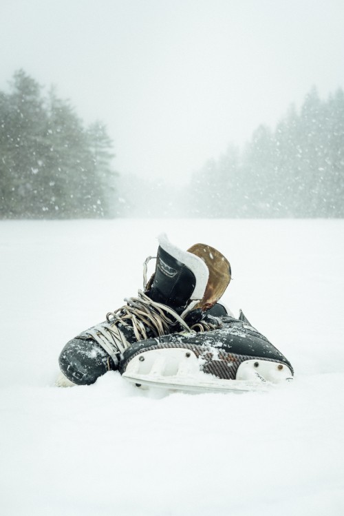 Image black and white snow ski on snow covered ground during daytime