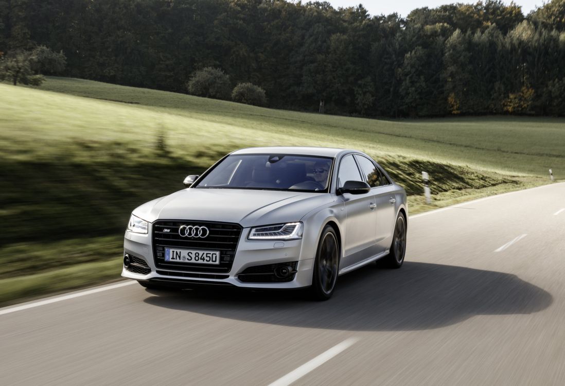 black audi coupe on road during daytime