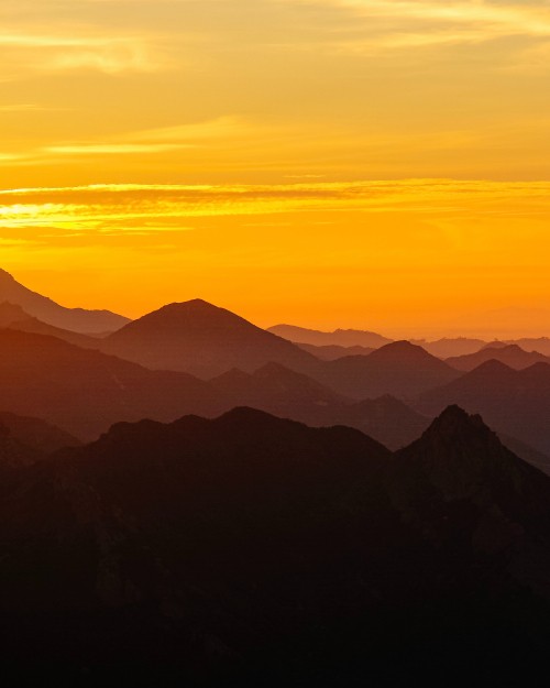 Image silhouette of mountains during sunset