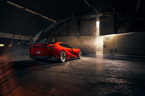 Image red porsche 911 parked in garage