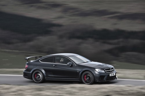 Image black mercedes benz coupe on road