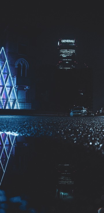 Image people walking on street during night time