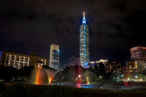 Image lighted high rise building during night time