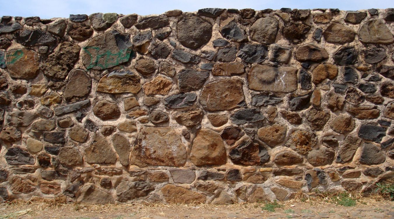 brown and gray stone wall