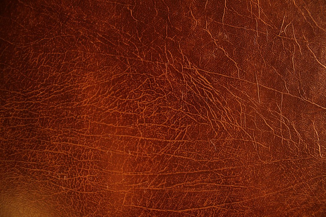Braunes Ledertextil in Nahaufnahmen. Wallpaper in 3456x2304 Resolution