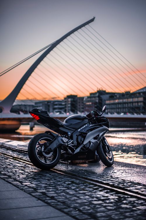 Black Sports Bike Parked on The Side of The Road. Wallpaper in 3798x5697 Resolution