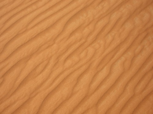 Image brown wooden table with white textile