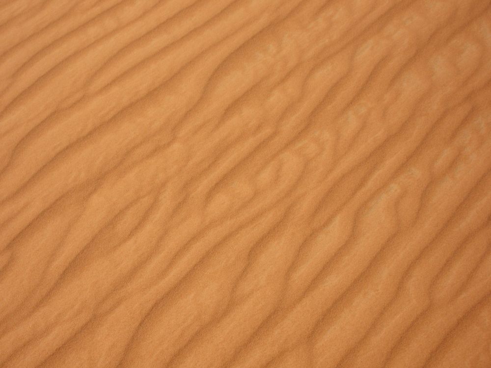 brown wooden table with white textile