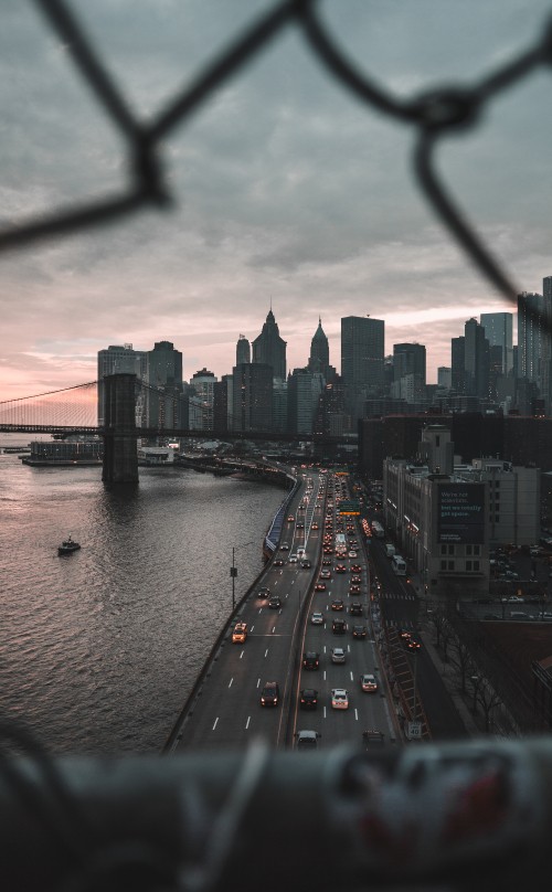 Image city skyline under cloudy sky during daytime