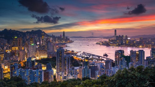 Image city skyline near sea during sunset