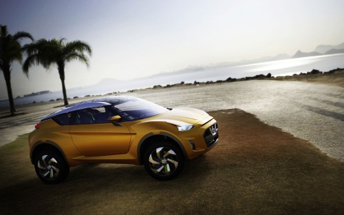 Image yellow chevrolet camaro on beach during daytime