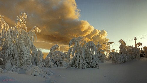 Image snow covered mountain under cloudy sky during daytime