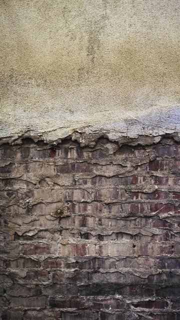 Image brown and grey brick wall