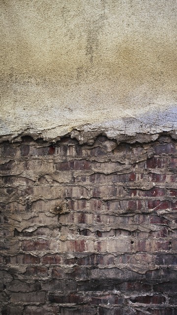 Image brown and grey brick wall