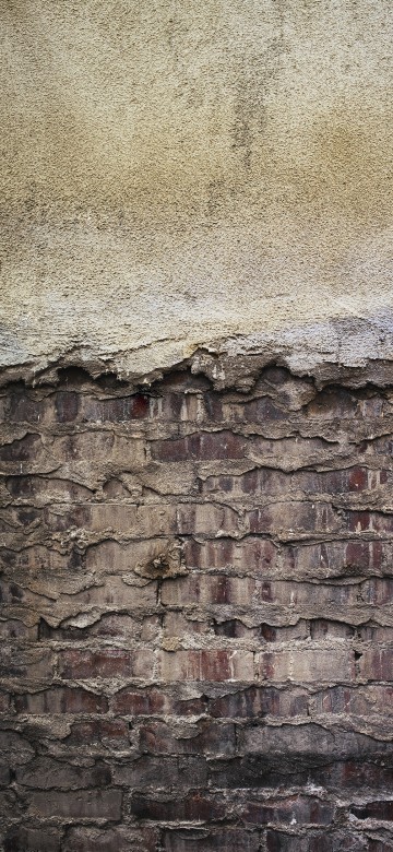 Image brown and grey brick wall