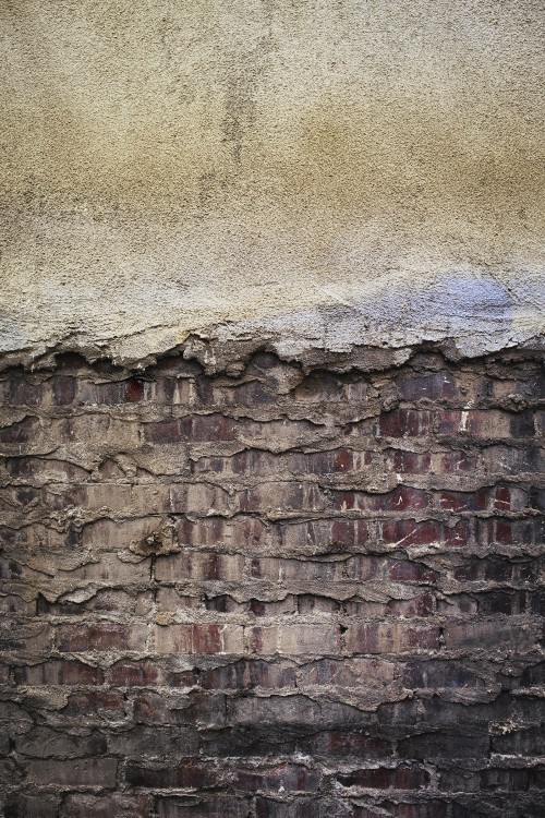 Image brown and grey brick wall