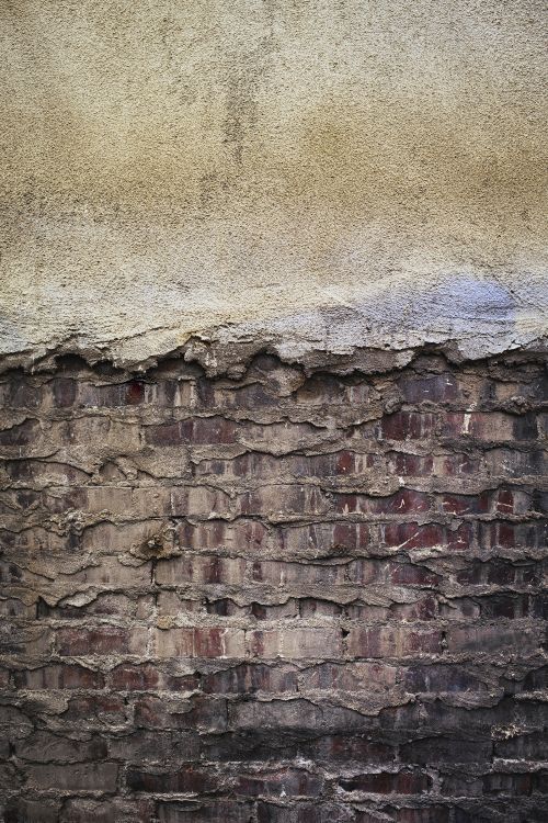 brown and grey brick wall