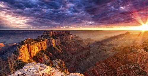 Image brown rocky mountain under gray clouds